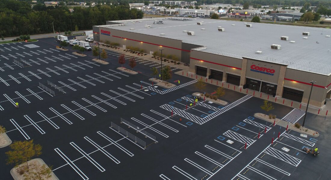 A newly painted parking lot in front of a Costco.