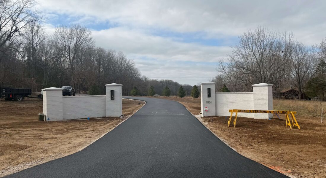 A freshly paved driveway.