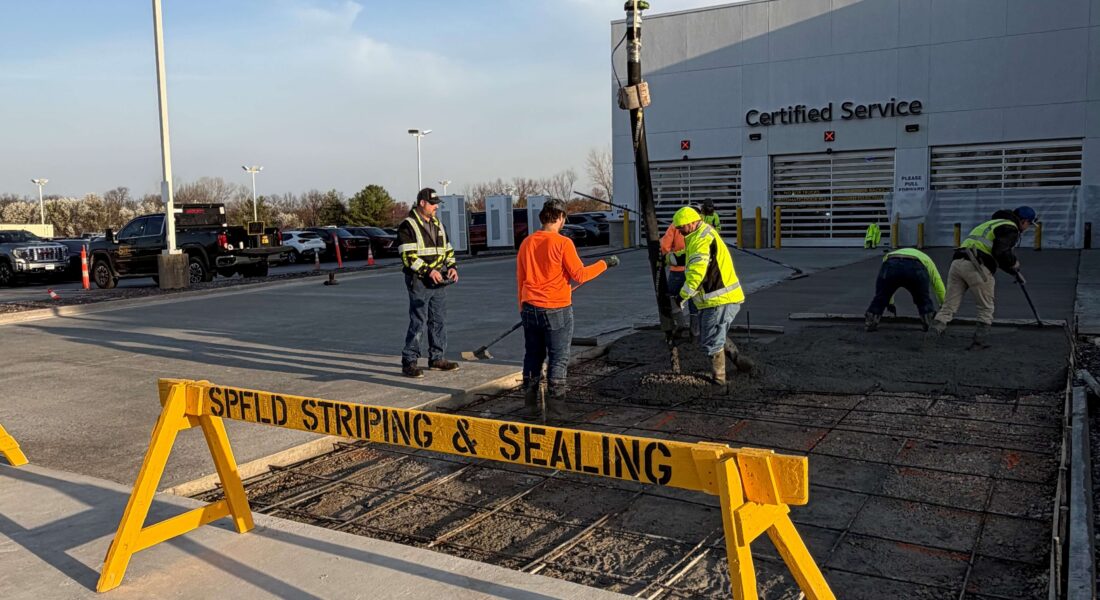 A SPFD Striping & Sealing barrier in front of an active work zone.